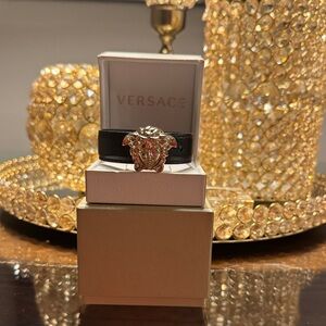 Versace Gold Medusa head black leather bracelet.